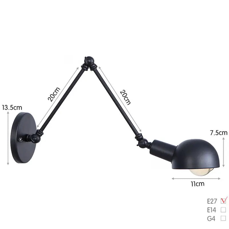 Adjustable wall-mounted light fixture in a bedroom with loft-style decor, highlighting its black matte finish and industrial appeal.