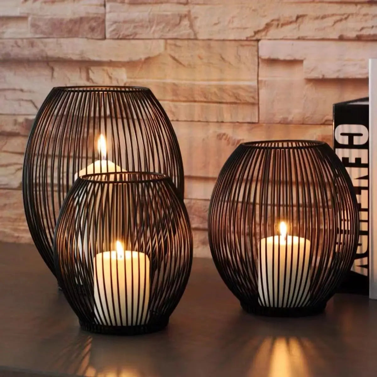 Set of 3 black metal wire candle lanterns with pillar candles, modern decorative candle holders for home, dining table, or living room.