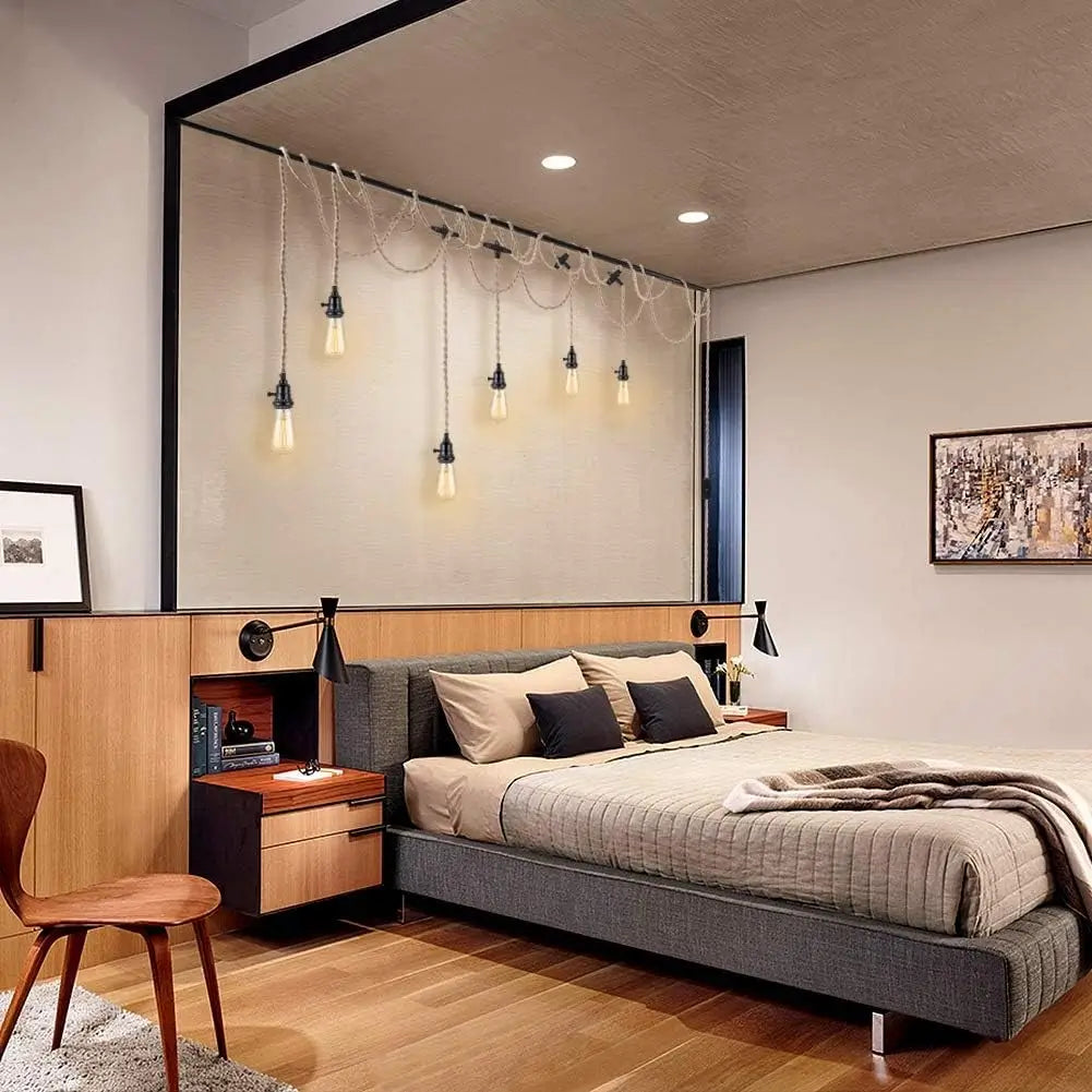 Cozy bedroom decorated with vintage plug-in pendant lights