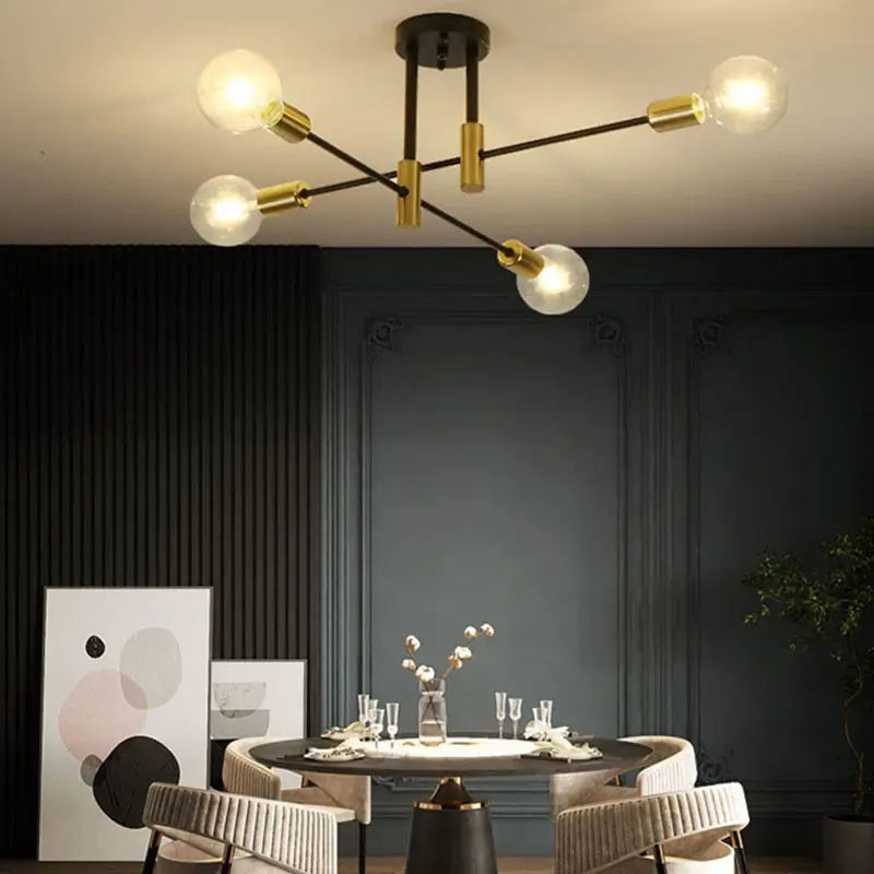 Black and gold modern ceiling light installed in a dining room, showcasing minimalist decor.