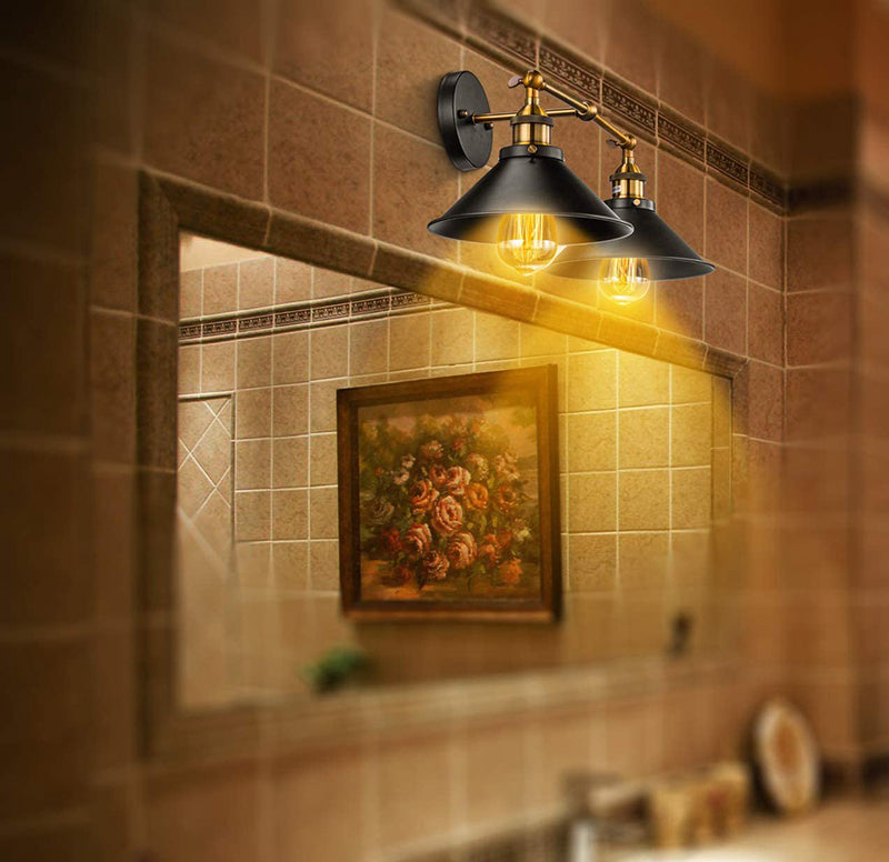 Double wall sconce used in bathroom decor, offering vintage charm with black and gold finishes