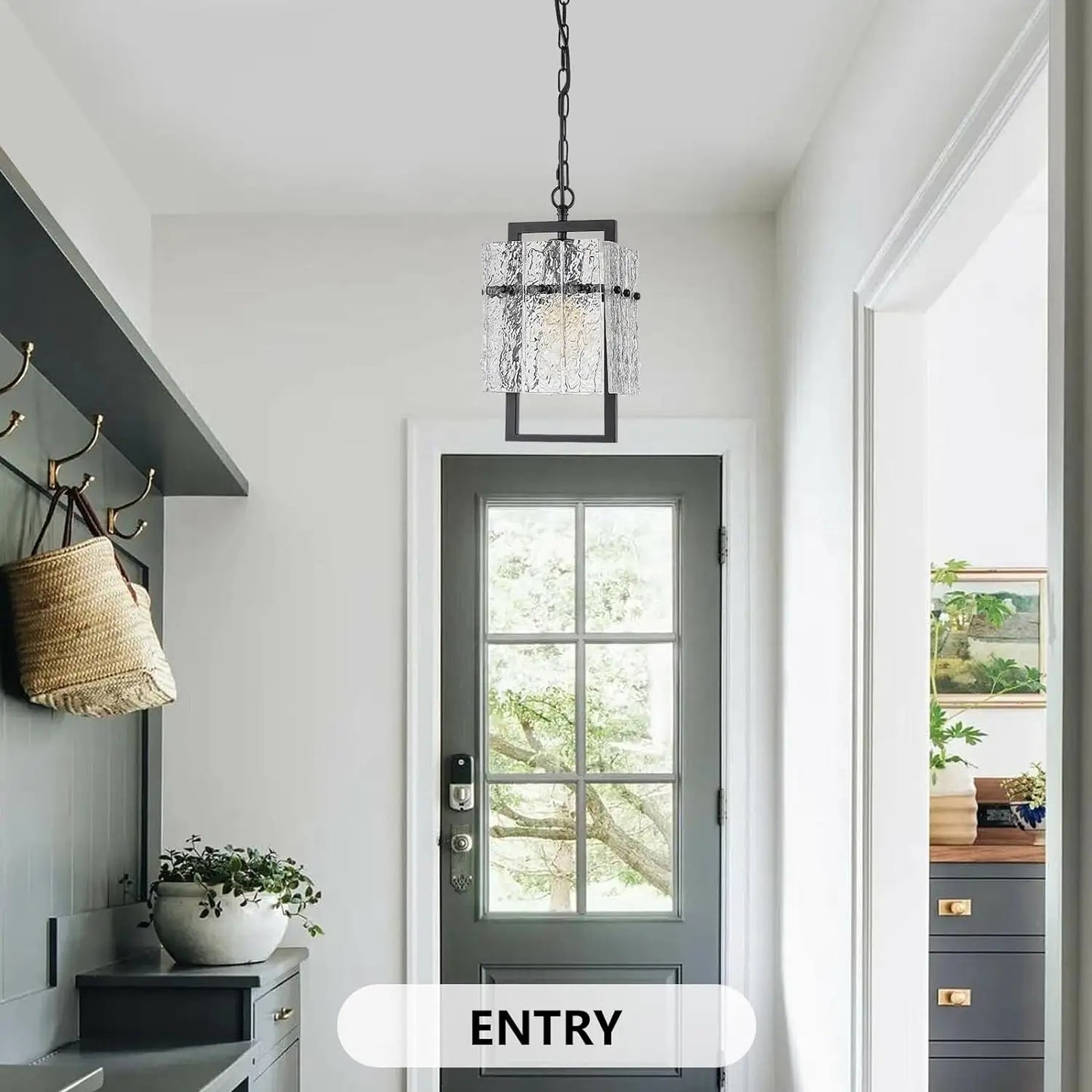 Farmhouse-style industrial pendant light hanging over a rustic kitchen island.