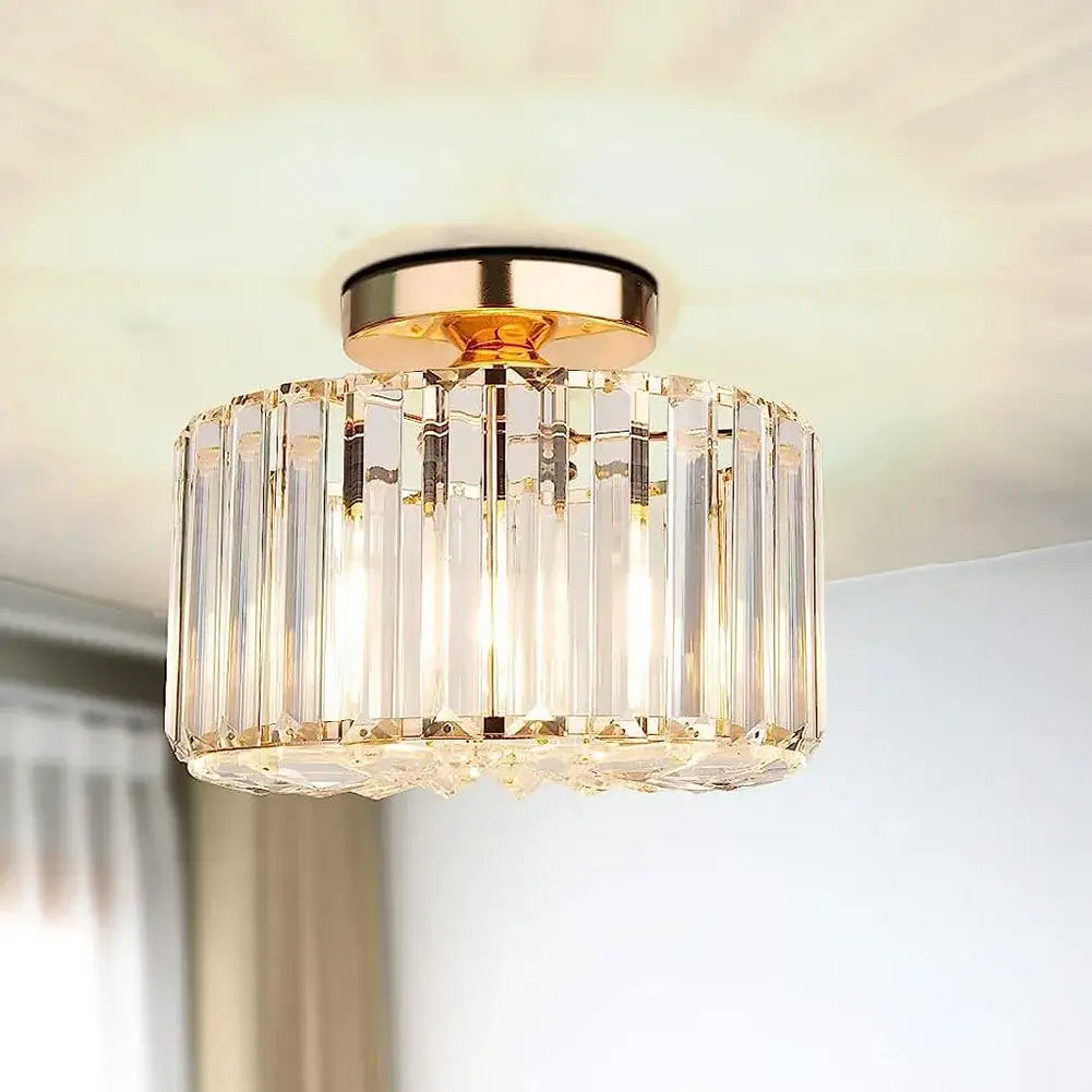 Luxury gold crystal ceiling light with a sleek finish, perfect for upscale interiors."