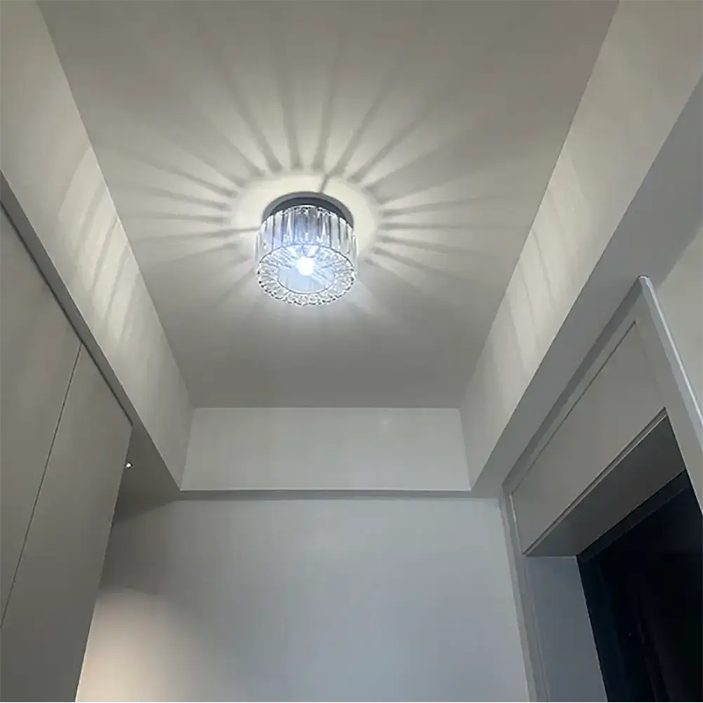 Crystal ceiling light installed in a hallway, adding a cozy and modern touch to the space.