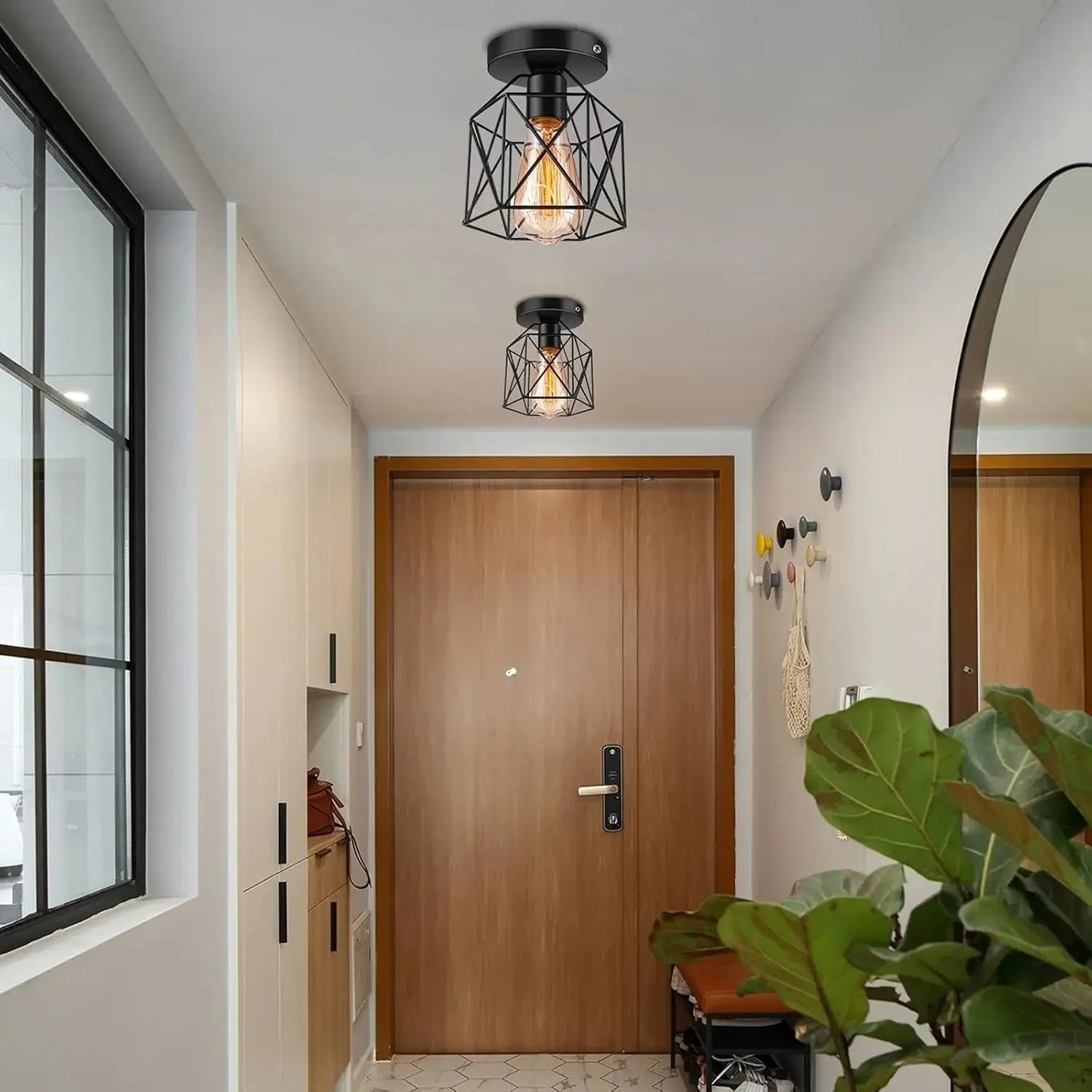 Industrial flush mount ceiling light in a narrow hallway, providing ample illumination