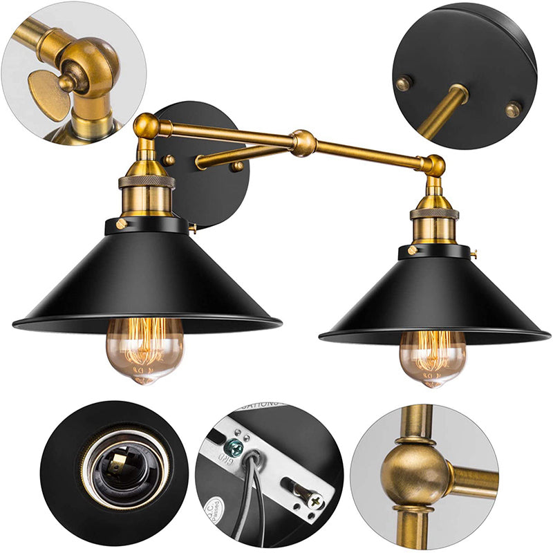Close-up view of the industrial double wall sconce with durable black metal shades, gold detailing, and quality construction.