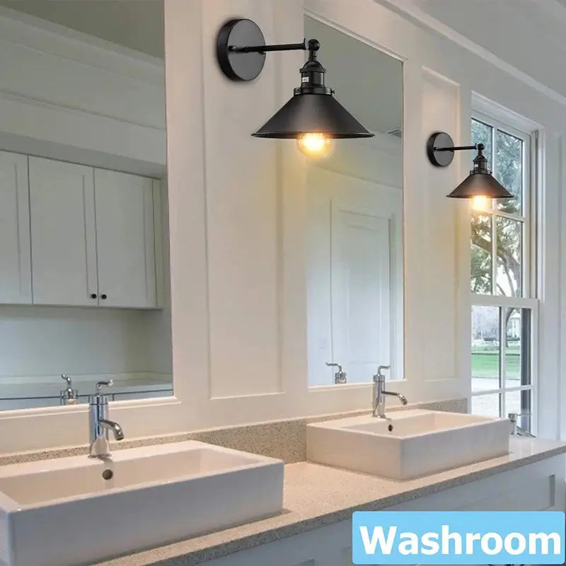 Industrial wall sconce lighting in a washroom, providing a stylish and rustic accent for a sink vanity.