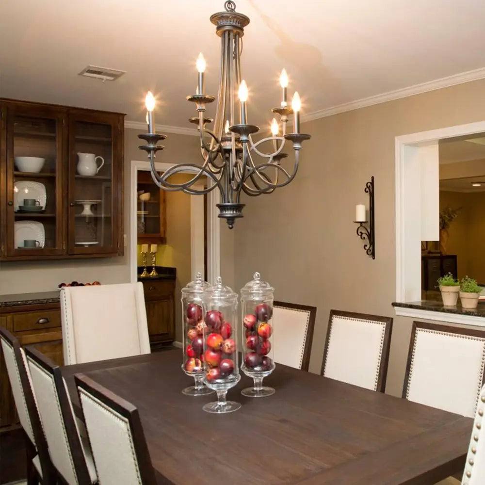 LED candelabra bulbs installed in a classic chandelier in dining room