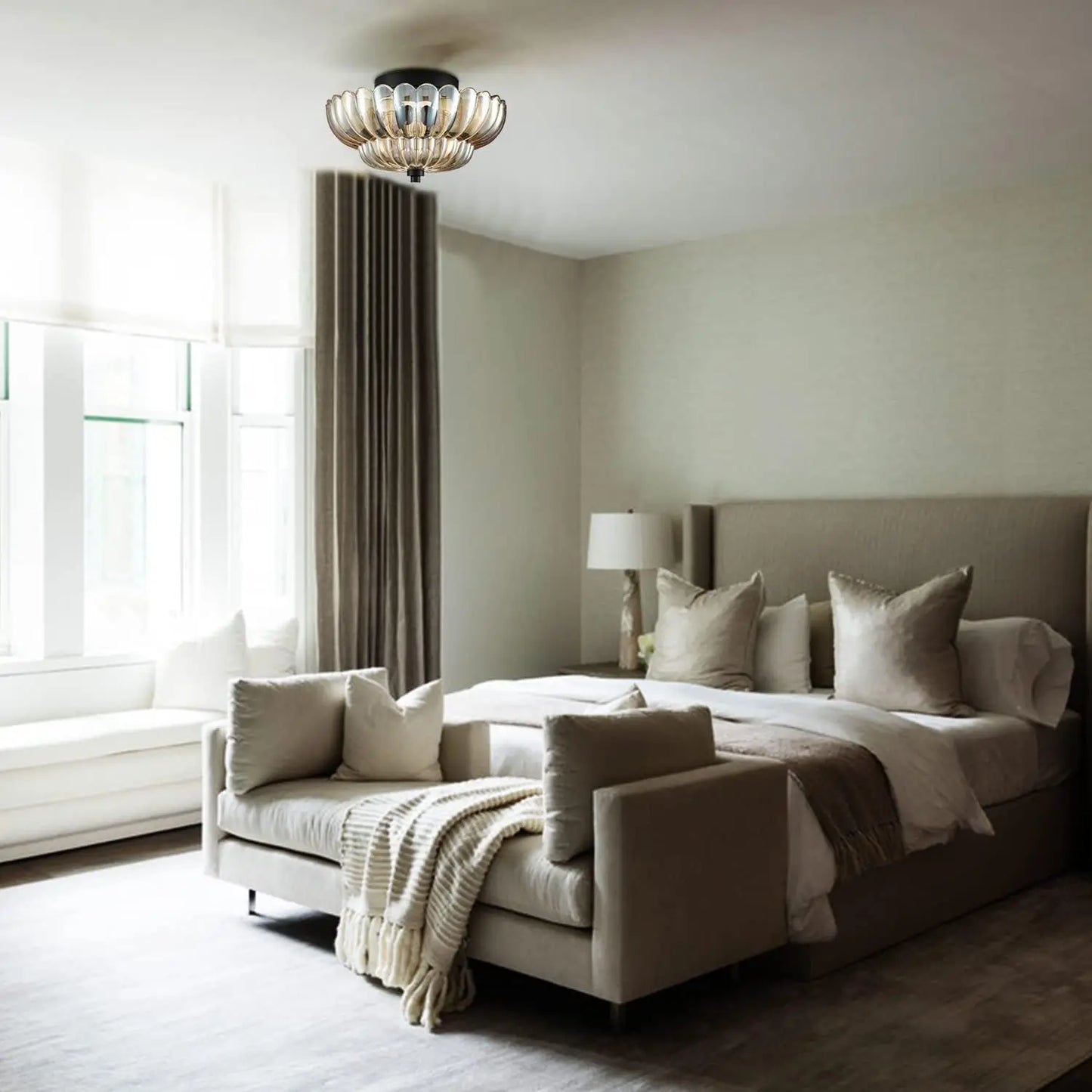 Amber glass ceiling flush light installed in a minimalist modern bedroom with neutral tones