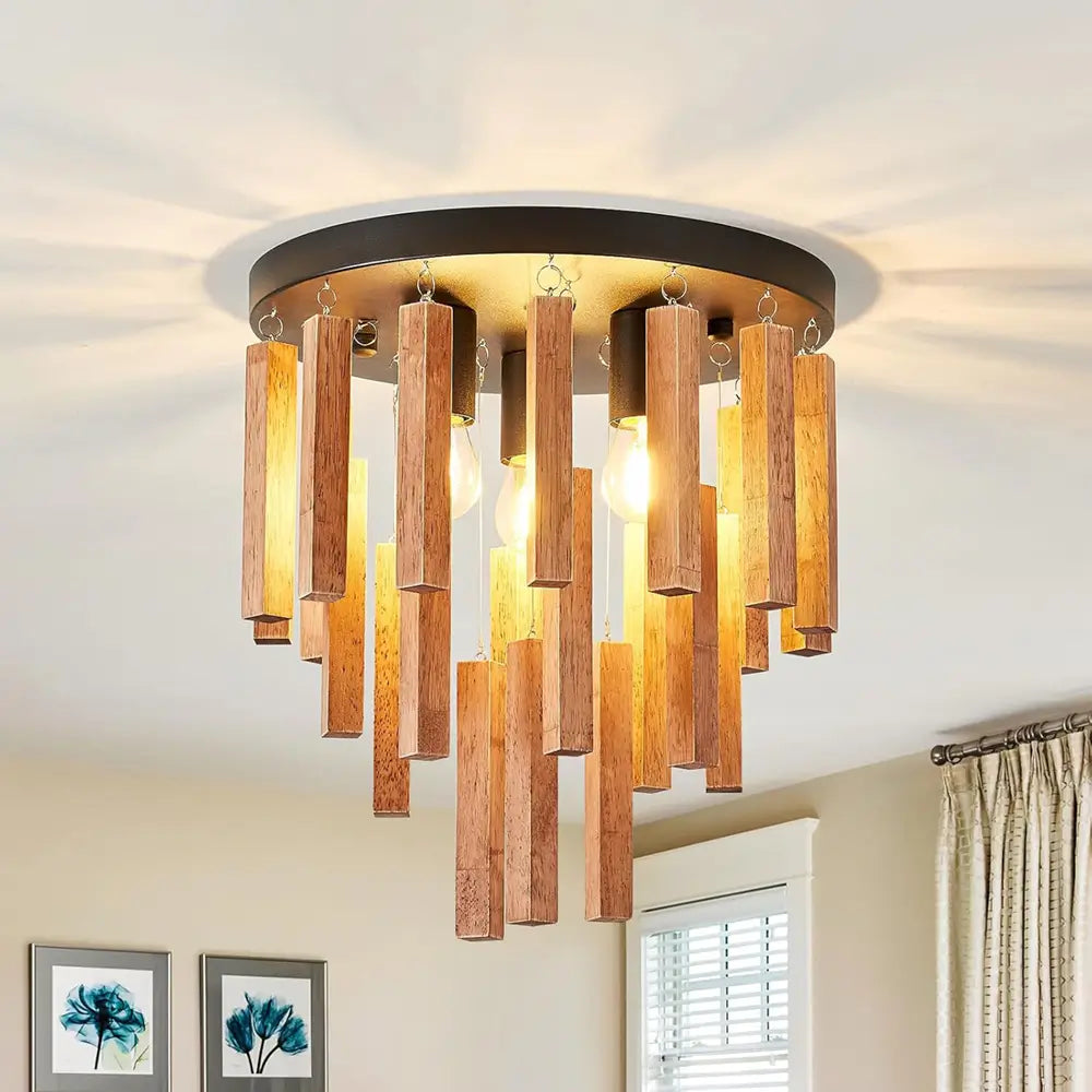 Close-up view of rustic modern flush mount ceiling light with wood pendants and E26 base bulbs