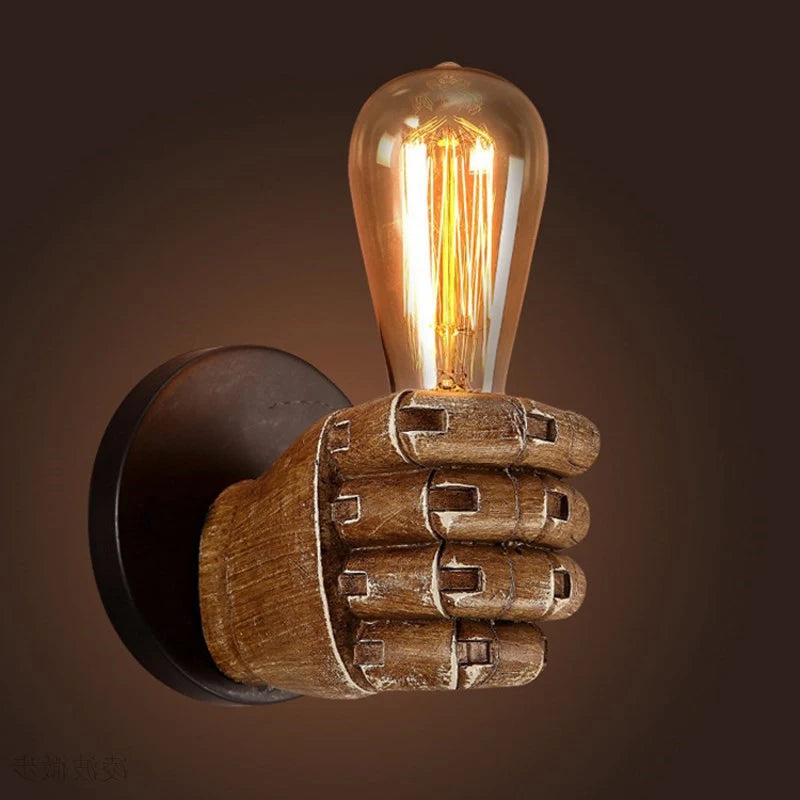 Detailed view of a wooden hand lamp featuring Edison-style bulb and durable wall mounting hardware for industrial spaces.