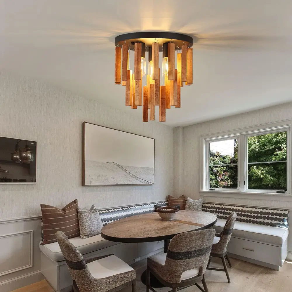 Dining area with round table illuminated by rustic wooden flush mount light