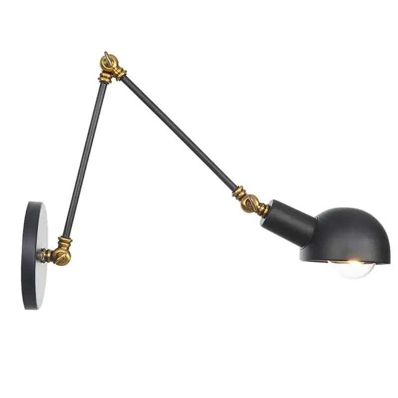 Vintage industrial swing arm wall lamp in black with brass joints, featuring an adjustable arm. Perfect for bedrooms and living rooms.