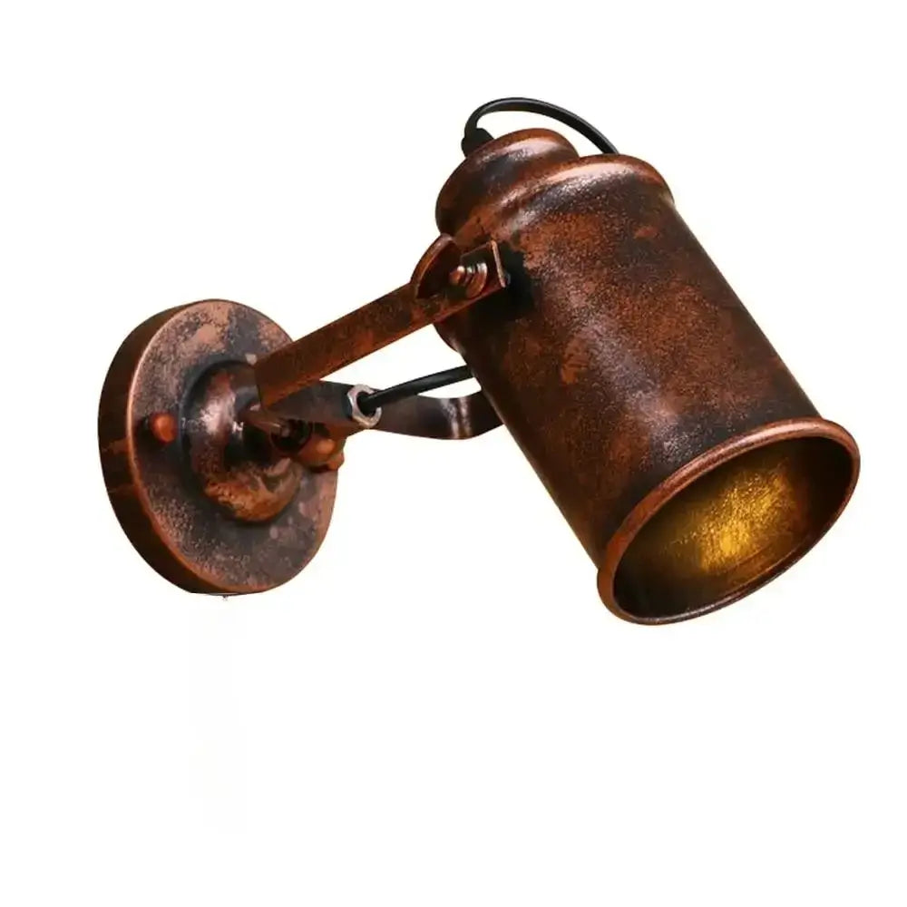 Vintage industrial wall sconce with an antique rust finish, featuring an adjustable arm and retro barn-style design.