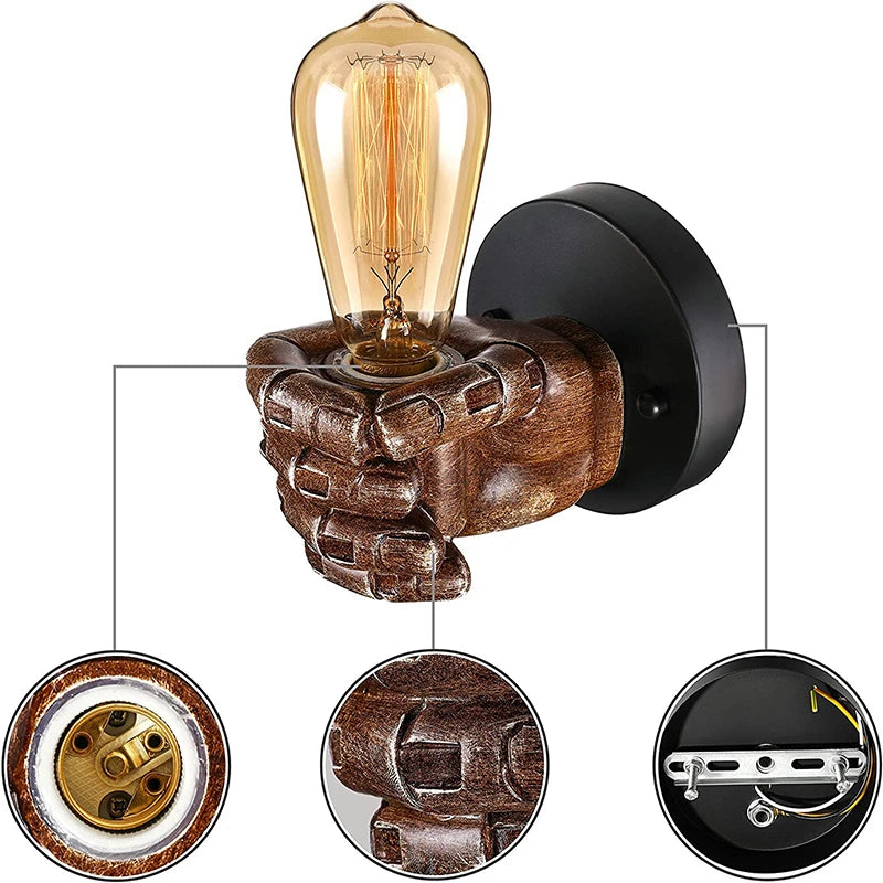 Vintage-style wall light held by a hand sculpture, great for vintage-themed homes or cafes.