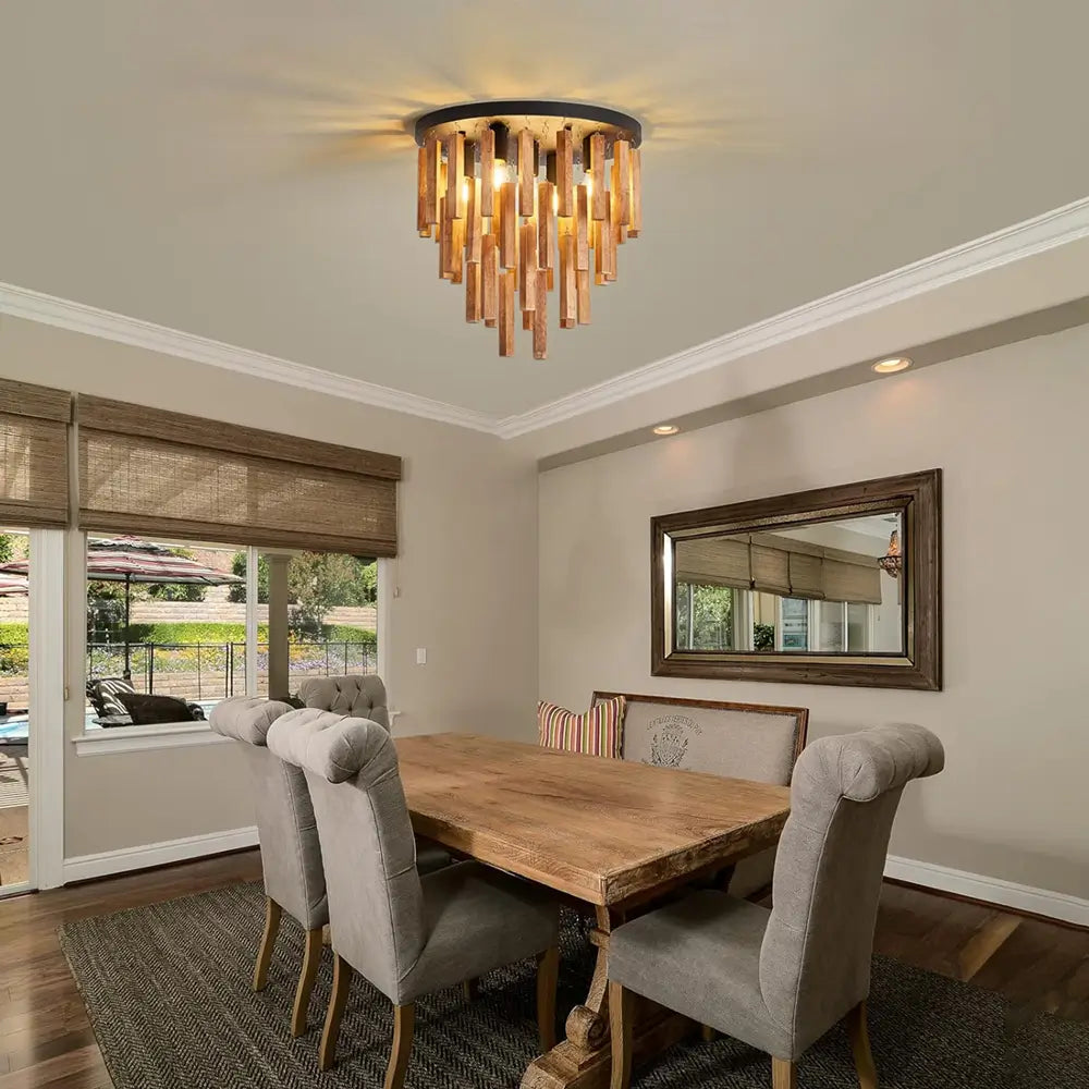 Elegant dining room with long table and wooden ceiling light fixture