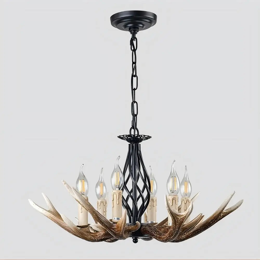 Front view of the antler chandelier with six candle-style lights, featuring a dark metal frame and realistic resin antlers.
