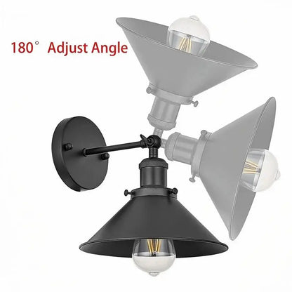 Adjustable industrial wall sconce in matte black finish, featuring a flexible arm for directional lighting.