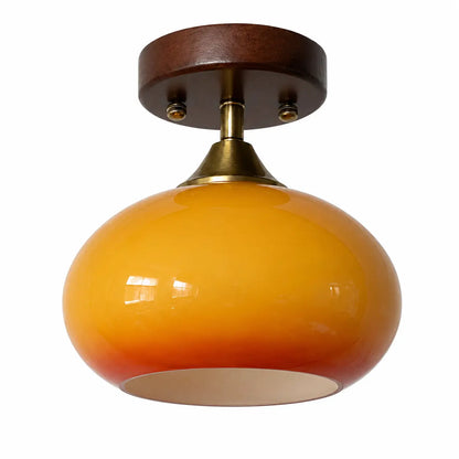 Underside view of amber glass shade showing the open light-diffusing base
