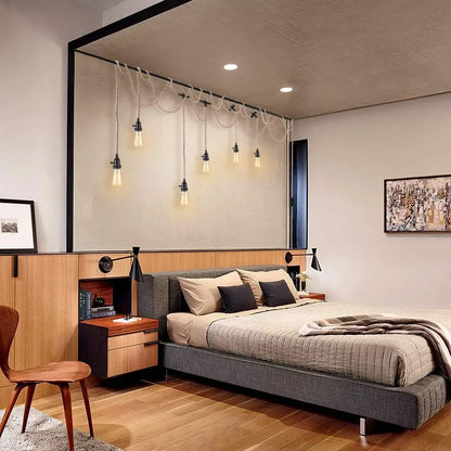 Cozy bedroom decorated with vintage plug-in pendant lights