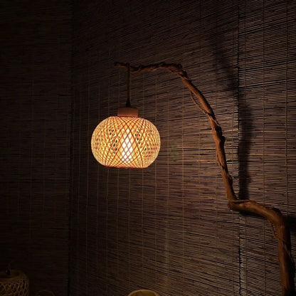Boho rustic style handmade bamboo lamp glowing in ambient evening light