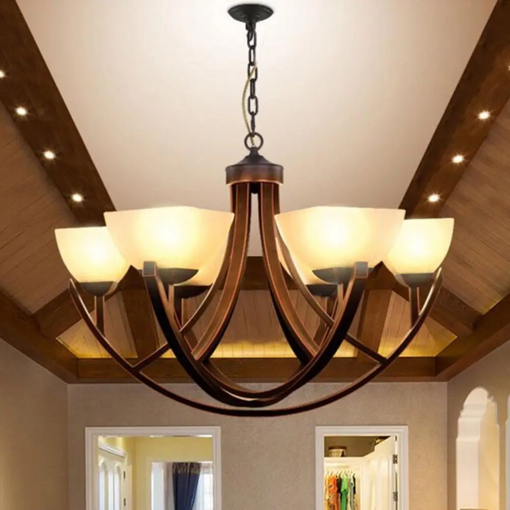 Classic 6-light bronze iron chandelier with frosted glass lampshades.