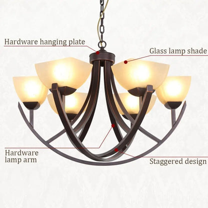Chandelier details showing hardware arms, hanging plate, and glass shades.