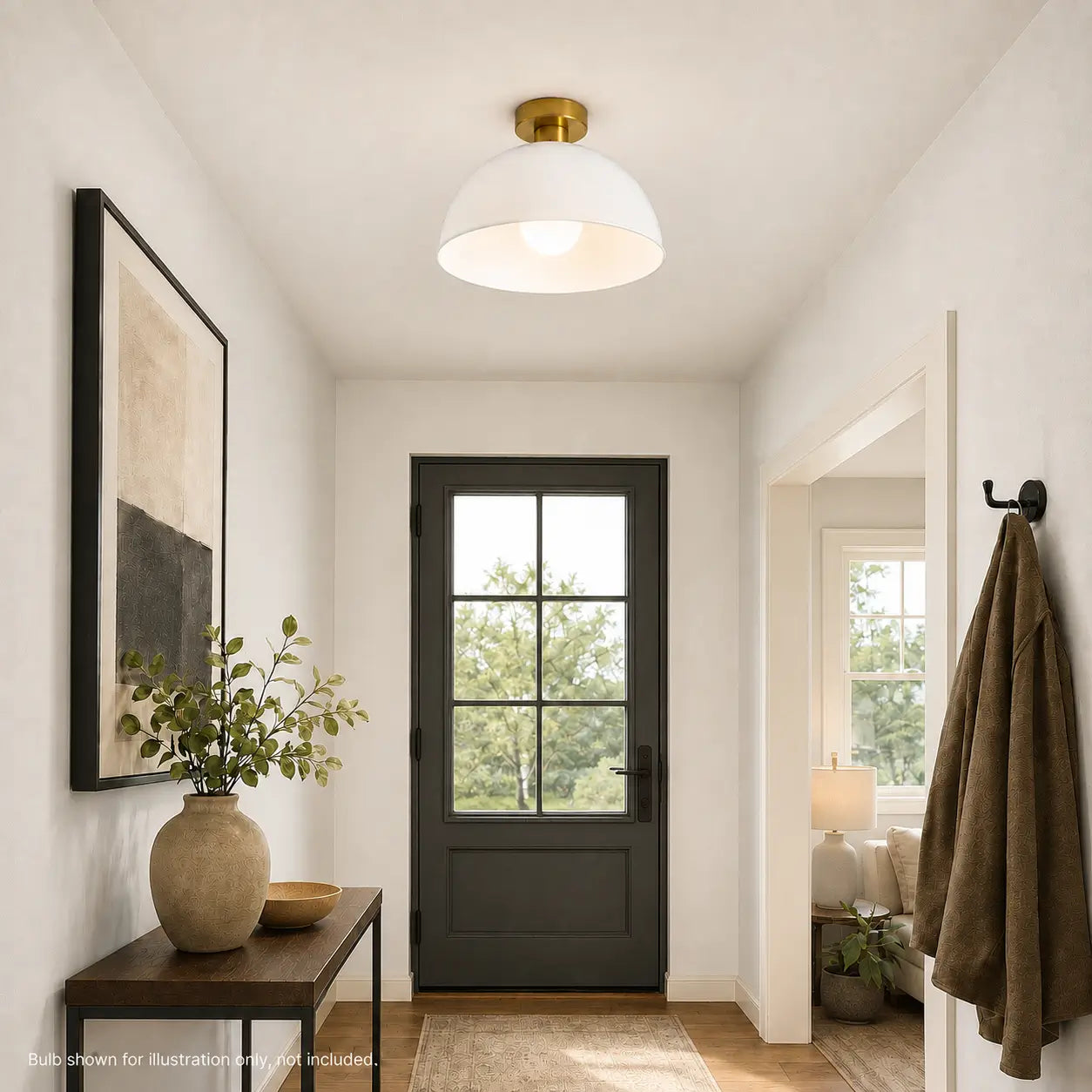 White dome ceiling light installed in a hallway near a front door and console table