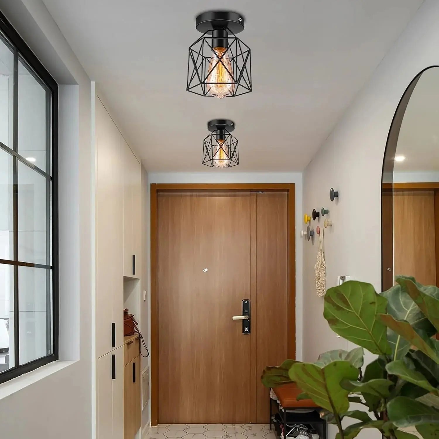 Industrial flush mount ceiling light in a narrow hallway, providing ample illumination