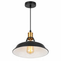 Matte black dome pendant light with a white interior and brass-toned top detail on a white background.