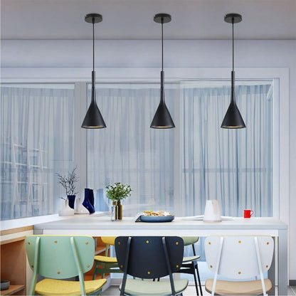 black kitchen pendant lighting over dining table