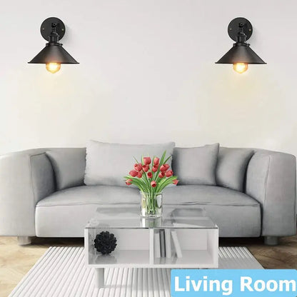 Modern wall sconce lighting in a living room, creating a cozy and decorative ambiance above a sofa.
