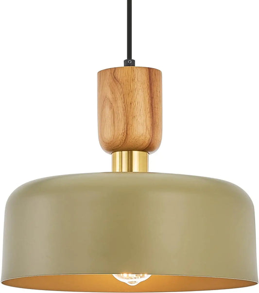 Close-up of modern pendant light with raw wood, gold finish, and green shade