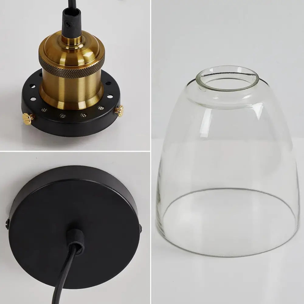Close-up of vintage pendant light components, including the brass bulb holder, black ceiling plate, and clear glass shade.