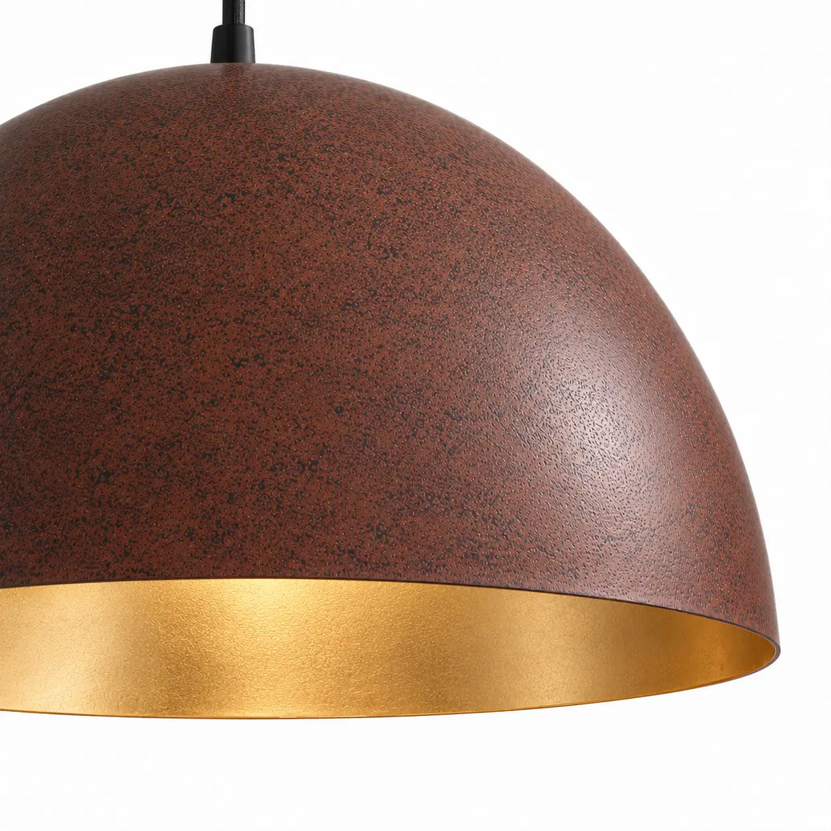 Close-up of a rust-brown metal dome pendant showing its finely mottled exterior and gold-toned interior.