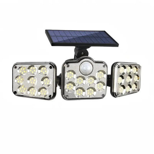 Front view of the outdoor solar motion sensor security light with 3 adjustable heads, showcasing the 138 bright LED lights and central motion sensor for enhanced home security.