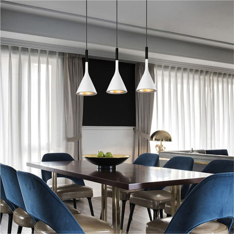 white pendant lamp over dining table